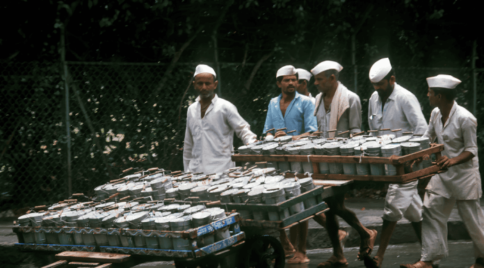 In many ways, the Mumbai dabbawala is a metaphor for the city itself: relentless, ingenious, imperfectly perfect. 