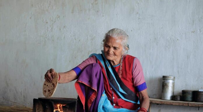 Elderly Woman Cooking a dish in the home. Courtesy: Ankit Rainloure, Pexels
